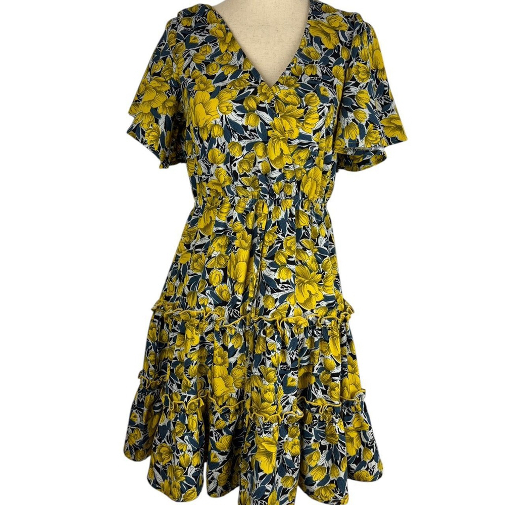 Yellow and navy floral print dress with ruffles and flared sleeves. Size small